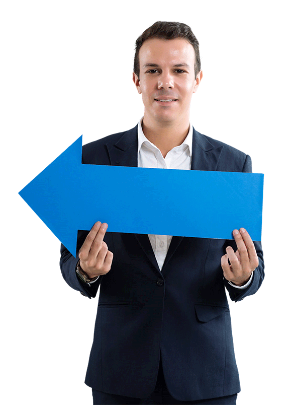 A guy in formal clothes holding a sign